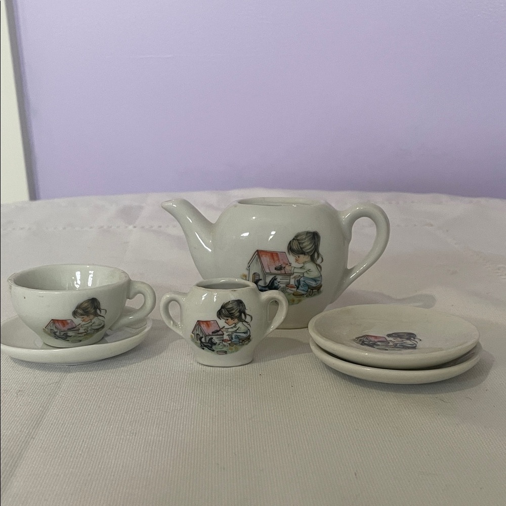 Charming White Tea Set with Child Illustration